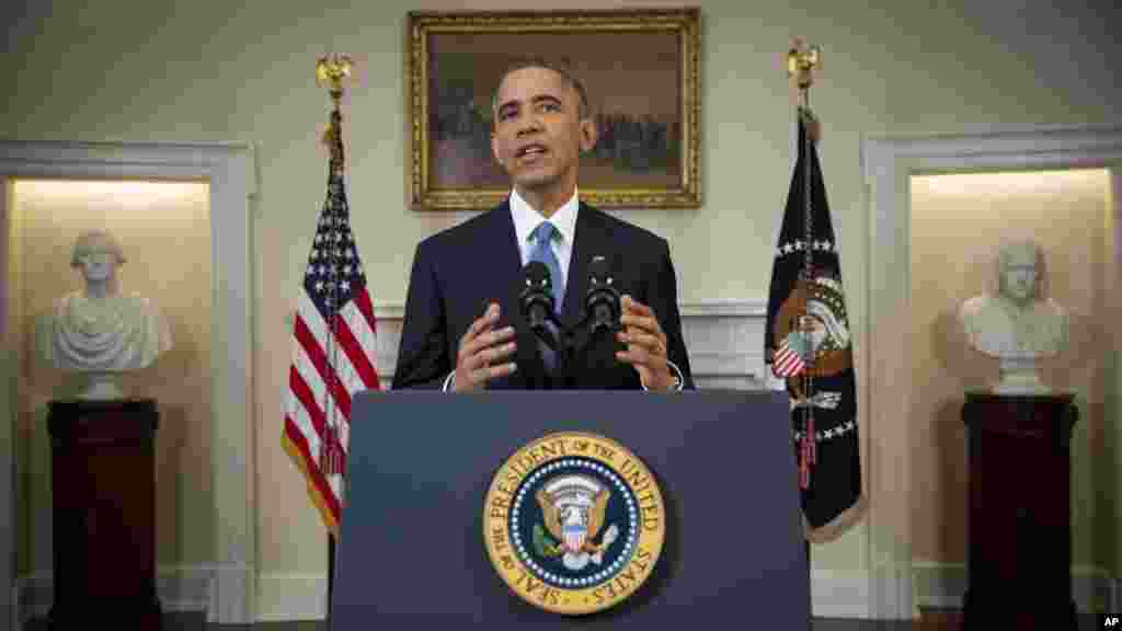 Le président Barack Obama annonce un changement majeur dans les relations américaines avec Cuba, dans la salle du Cabinet de la Maison Blanche à Washington, le 17 décembre 2014. (AP)