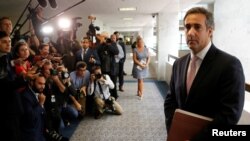 Michael Cohen, personal attorney for U.S. President Donald Trump, talks to reporters after meeting with Senate Intelligence Committee staff as the panel investigates alleged Russian interference in the 2016 U.S. presidential election, on Capitol Hill in W