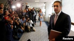 FILE - Michael Cohen, personal attorney for U.S. President Donald Trump, talks to reporters in the 2016 U.S. presidential election, on Capitol Hill.