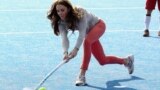 March 15, 2012. Britain's Catherine, Duchess of Cambridge plays hockey with the Team GB hockey teams at Riverside Arena in the Olympic Park in London.