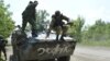 VOA Witnesses Troops on Move in E. Ukraine 