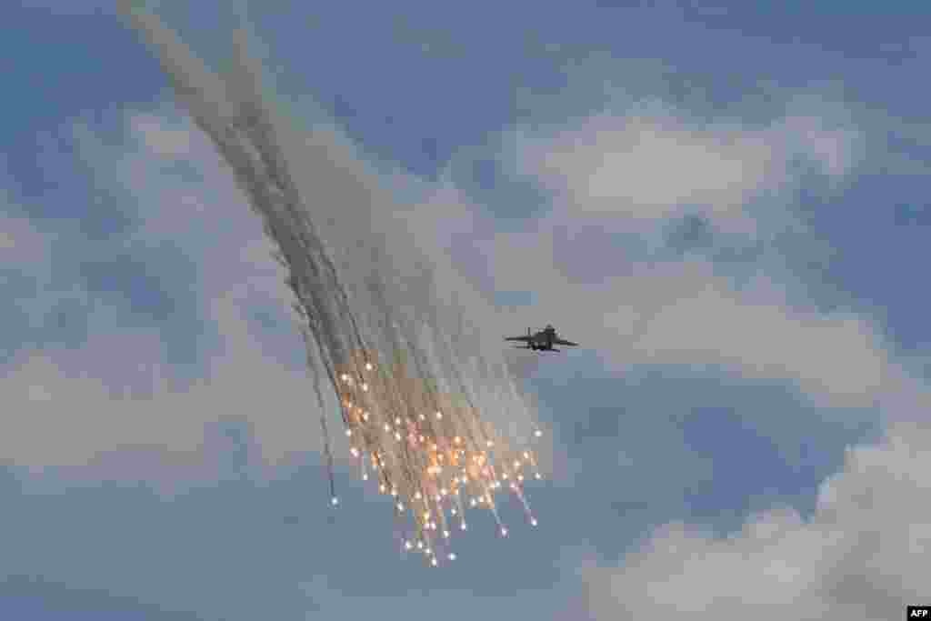 A Singapore Air Force F-15SG fighter jet takes part in a show at the Singapore Airshow.