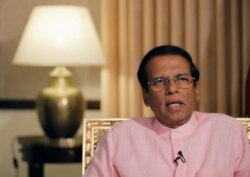 FILE - Sri Lanka's President Maithripala Sirisena speaks during an interview with Reuters at his residence in Colombo, Sri Lanka, May 4, 2019.