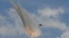 A Singapore Air Force F-15SG fighter jet participates in an aerial display at the Singapore Airshow.