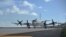 FILE - A Japan Maritime Self-Defense Force P-3C Orion arrives at Kaneohe Bay, Hawaii, June 25, 2018. 