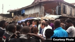 FILE - CDC Director Dr. Tom Frieden talks with Ebola survivors in Magazine Wharf, Sierra Leone. (Courtesy - U.S. Centers for Disease Control)