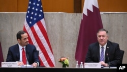 Secretary of State Mike Pompeo welcomes Qatar's Deputy Prime Minister Mohammed bin Abdulrahman Al Thani to launch the third annual U.S.-Qatar Strategic Dialogue at the State Dept., Monday, Sept. 14, 2020 in Washington. (Erin Scott/Pool via AP)