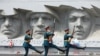 Honor guards march near a World War II monument on the anniversary of the beginning of the Great Patriotic War against Nazi Germany in 1941 in Stavropol, Russia.