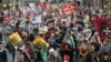Thousands March Against British Government's Austerity Plan
