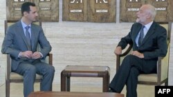 Президент Сирії Башар аль-Асад (ліворуч) зістрічається з головою Міжнародного комітету Червоного Хреста Якобом Келленберґером