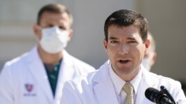 Dr. Sean Conley, physician to President Donald Trump, briefs reporters at Walter Reed National Military Medical Center in Bethesda, Md., Sunday, Oct. 4, 2020.