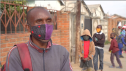 Fifty-three year old Shepherd Mbuwa an informal trader walks daily more than 30 minutes twice a day to get food for his three kids at Samantha’s kitchen, (Columbus Mavhunga/VOA)