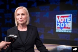 FILE - Sen. Kirsten Gillibrand, D-N.Y., speaks to reporters after the New York State Senate debate hosted by WABC-TV, Oct. 25, 2018 in New York.