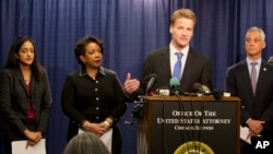  U.S. Attorney Zachary T. Fardon of the Northern District of Illinois speaks during a news conference accompanied by Principal Deputy Assistant Attorney General Vanita Gupta (left) Attorney General Loretta Lynch, and Chicago Mayor Rahm Emanuel, Jan. 13, 2017.