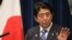 Japanese Prime Minister Shinzo Abe speaks during a press conference at his official residence after summit meetings with 10 Southeast Asian countries, in Tokyo, Dec. 14, 2013.