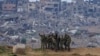 Soldados israelíes se toman una foto en una posición en la frontera con la Franja de Gaza, en el sur de Israel, el 19 de febrero de 2024