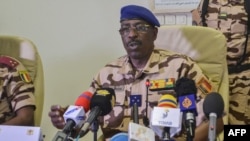 FILE - Chad's Defense Minister General Brahim Daoud Yaya speaks during a press conference at the Defense Ministry of in N'Djamena, May 6, 2021. 