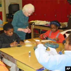 Nancy Grace Roman teaches astronomy to 5th graders at Shepherd Elementary School in Washington, DC, in the late 1990s.