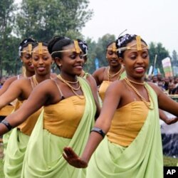 Dancers marking Kwita Izina in Rwanda, a holiday celebrating the births of rare baby mountain gorillas. At present there are only 780 in the world.