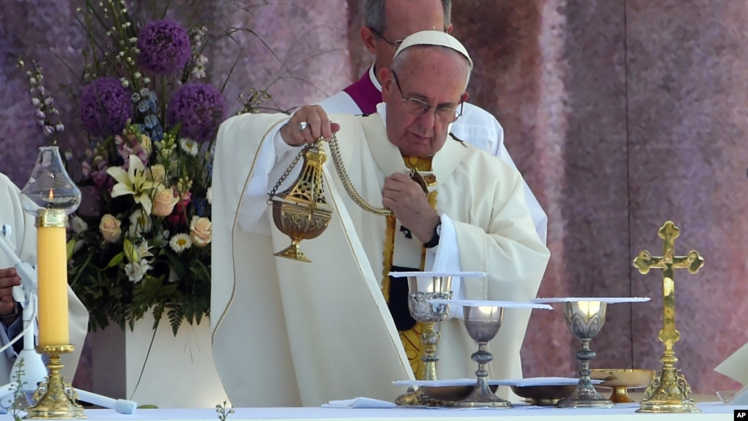 Pope Francis incenses the altar as he celebrates a Holy Mass in Brzegi, near Krakow, Poland, July 31, 2016. 