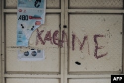 In Goma, Democratic Republic of Congo, a shop sits looted with the name of Rwandan President Paul Kagame written on a door following clashes in the eastern DRC city, on Jan. 30, 2025.