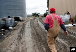 Blake Hurst, a corn and soybean farmer and president of the Missouri Farm Bureau, walks to the tractor shed on his farm in Westboro, Mo., April 4, 2017. U.S. President Donald Trump has vowed to redo the North American Free Trade Agreement, but NAFTA has