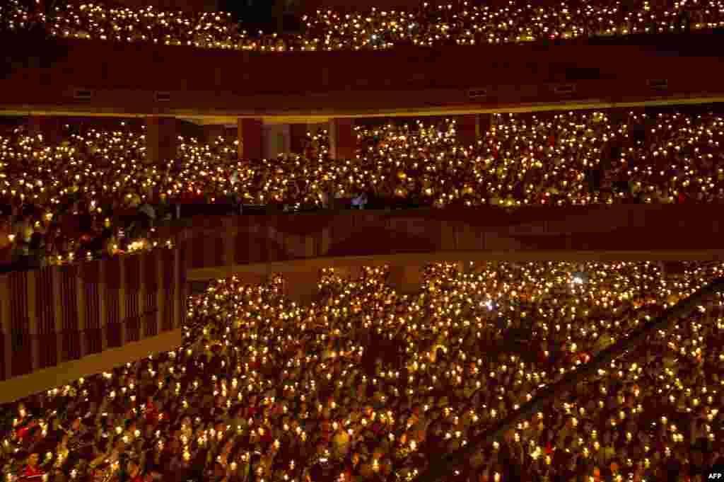 Christians attend Christmas Eve Mass at a stadium in Surabaya, Indonesia&#39;s second largest city, Dec. 24, 2017.