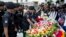 Benazir Ahmed, Director General of Rapid Action Battalion (RAB), offers his tribute in front of the building once housed the Holey Artisan Bakery, on the second anniversary of the deadly hostage crisis at the upscale Dhaka restaurant in Bangladesh, July 1