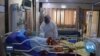 A Year of Pandemic: In Middle East, Coronavirus Compounds Conflict