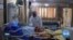 A Year of the Pandemic: In Middle East, Coronavirus Compounds Conflict