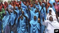 Thousands of Somalis rally in the Somali capital Mogadishu, August 23, 2011 at the Konis stadium as part of government organized demonstrations in support of the withdrawal of al- Shabab from Mogadishu.