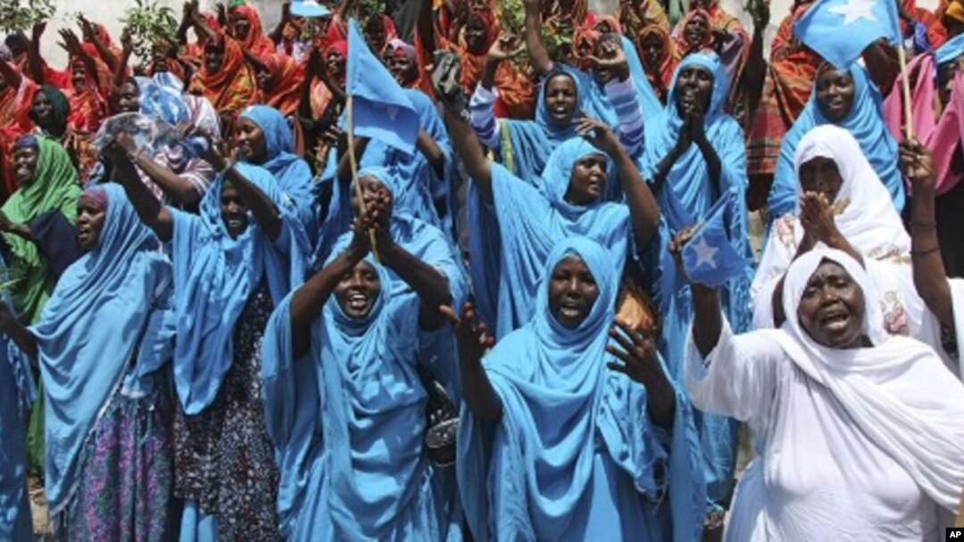 Thousands of Somalis rally in the Somali capital Mogadishu, August 23, 2011 at the Konis stadium as part of government organized demonstrations in support of the withdrawal of al- Shabab from Mogadishu.