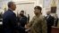 FILE - A member of U.S. delegation (L) shakes hand with a member of Pakistani delegation before a meeting in Kabul, Afghanistan, January 18, 2016. Pakistani officials are particularly furious at a Congressional hearing last week in Washington under the title “Pakistan: Friend or foe.”