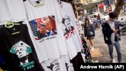 T-shirts depicting U.S. President Donald Trump and North Korean leader Kim Jong Un are displayed for sale in a tourist area in Hanoi, Vietnam, Tuesday, Feb. 26, 2019. 