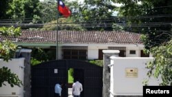 A man walks in the Taiwan embassy a day after the Salvadoran government announced that it has broken off diplomatic relations with Taiwan, in San Salvador, El Salvador, Aug. 21, 2018. 