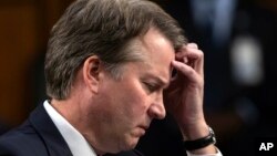 Supreme Court nominee, Brett Kavanaugh waits to testify before the Senate Judiciary Committee for the third day of his confirmation hearing, on Capitol Hill in Washington, Sept. 6, 2018. 