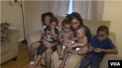 Flint resident Ariana Hawk with her 5 children. Sincere, 4 at the time of this photo, is on the far right.