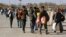 Një grup refugjatësh afganë