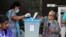 A person votes at a polling station during the Fijian general election in Suva, Fiji, Dec. 14, 2022. 