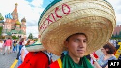 A Mexico fan walks at the Red Square in Moscow during the Russia 2018 World Cup football tournament, June 21, 2018. 