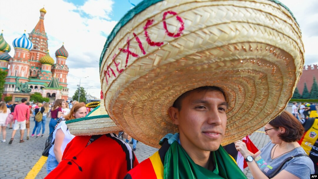 A Mexico fan walks at the Red Square in Moscow during the Russia 2018 World Cup football tournament, June 21, 2018. 