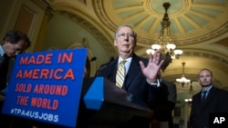 Senate Majority Leader Mitch McConnell of Ky. speaks during a news conference on Capitol Hill in Washington, May 19, 2015, with small business owners to discuss the Trade Promotion Authority bill. 