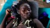 FILE - A South Sudanese woman suffering from cholera lies on a bed at Juba Teaching Hospital in Juba, May 27, 2014. 