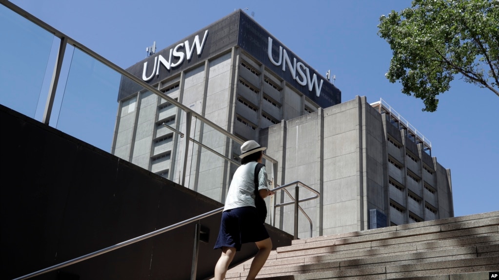 FILE - A student walks around the University of New South Wales campus in Sydney, Australia, Tuesday, Dec. 1, 2020. 