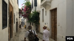 A photo of tourists visiting the Tunis Medina. Ben Gacem suggests Tunisia hasn't sold it's 'best story' to foreigners flocking to the country. (VOA/Lisa Bryant)