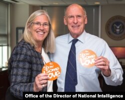 FILE - Principal Deputy Director of National Intelligence Sue Gordon and Director of National Intelligence Dan Coats.