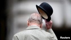 FILE PHOTO: Britain's Prince Philip, in his role as Captain General, Royal Marines, attends a Parade to mark the finale of the 1664 Global Challenge, on the Buckingham Palace Forecourt, in central London, Britain August 2, 2017. 