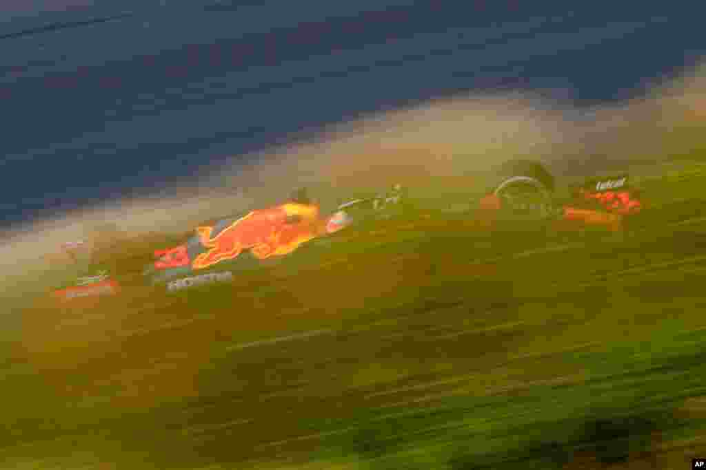 Red Bull driver Max Verstappen of the Netherlands steers his car during the first free practice ahead of Sunday's Formula One Dutch Grand Prix at the Zandvoort racetrack, Netherlands.