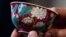A magnificent Ruby-Ground Falangcai "Double-Lotus" Bowl Blue Enamel Yuzhi Mark and Period of Kangxi is shown after being sold for HK$74 million ($9.5 million) at Sotheby's Spring Sales in Hong Kong, April 8, 2013. 
