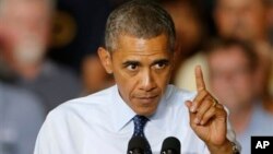 President Barack Obama speaks to workers at the Ford Kansas City Stamping Plant in Liberty, Missouri, Sept. 20, 2013.